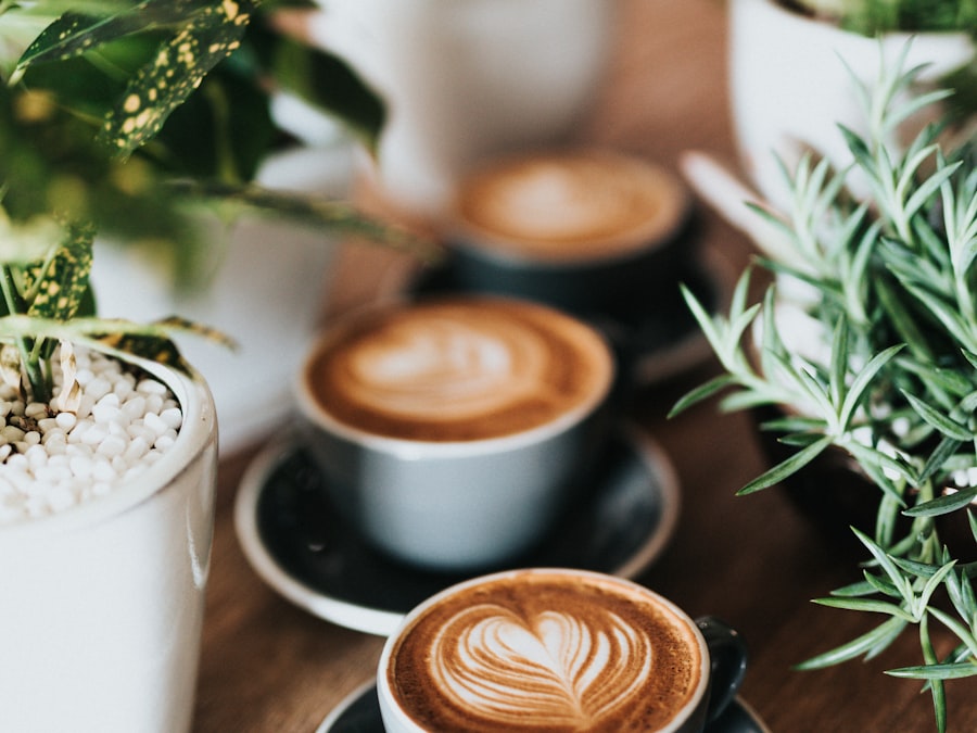 Coffee being poured into a cup in warm light